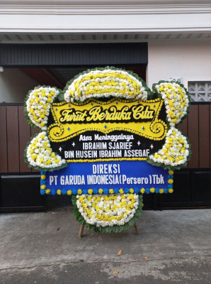 Papan Bunga Duka di Serba Jadi